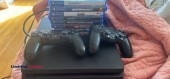 ps4 slim 500gb with g games 2 controllers - (charleston)