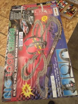 Like new Slot car race track with car - (Still wrapped in plastic)