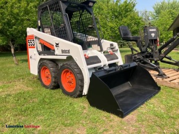 Bobcat Skid Steer Model 553 with Backhoe attachment - (EAU CLAIRE)