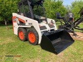 Bobcat Skid Steer Model 553 with Backhoe attachment - (EAU CLAIRE)